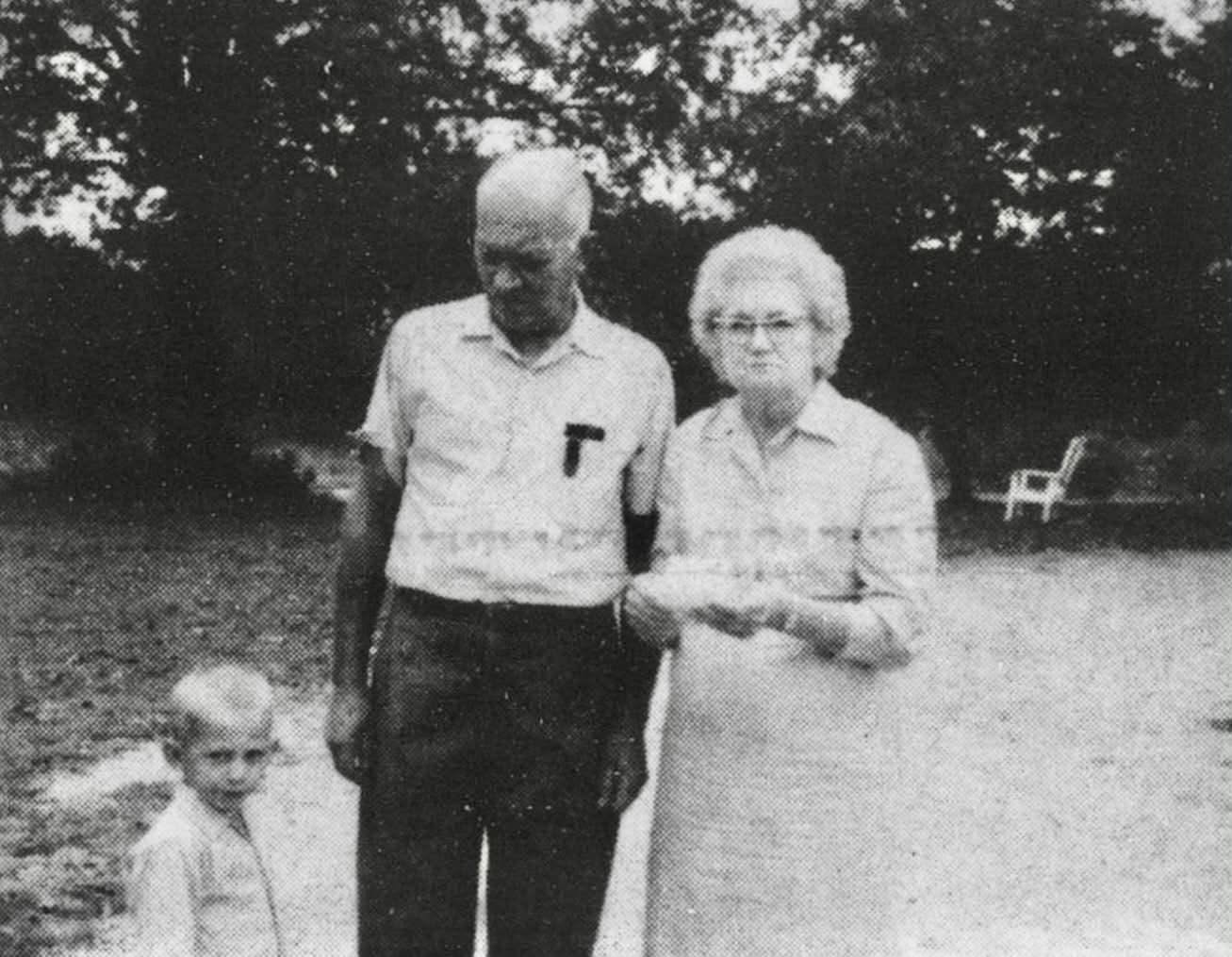 Wallis and Mae Tatum with their grandson Danny McGhee on their Forsyth County farm in 1965.